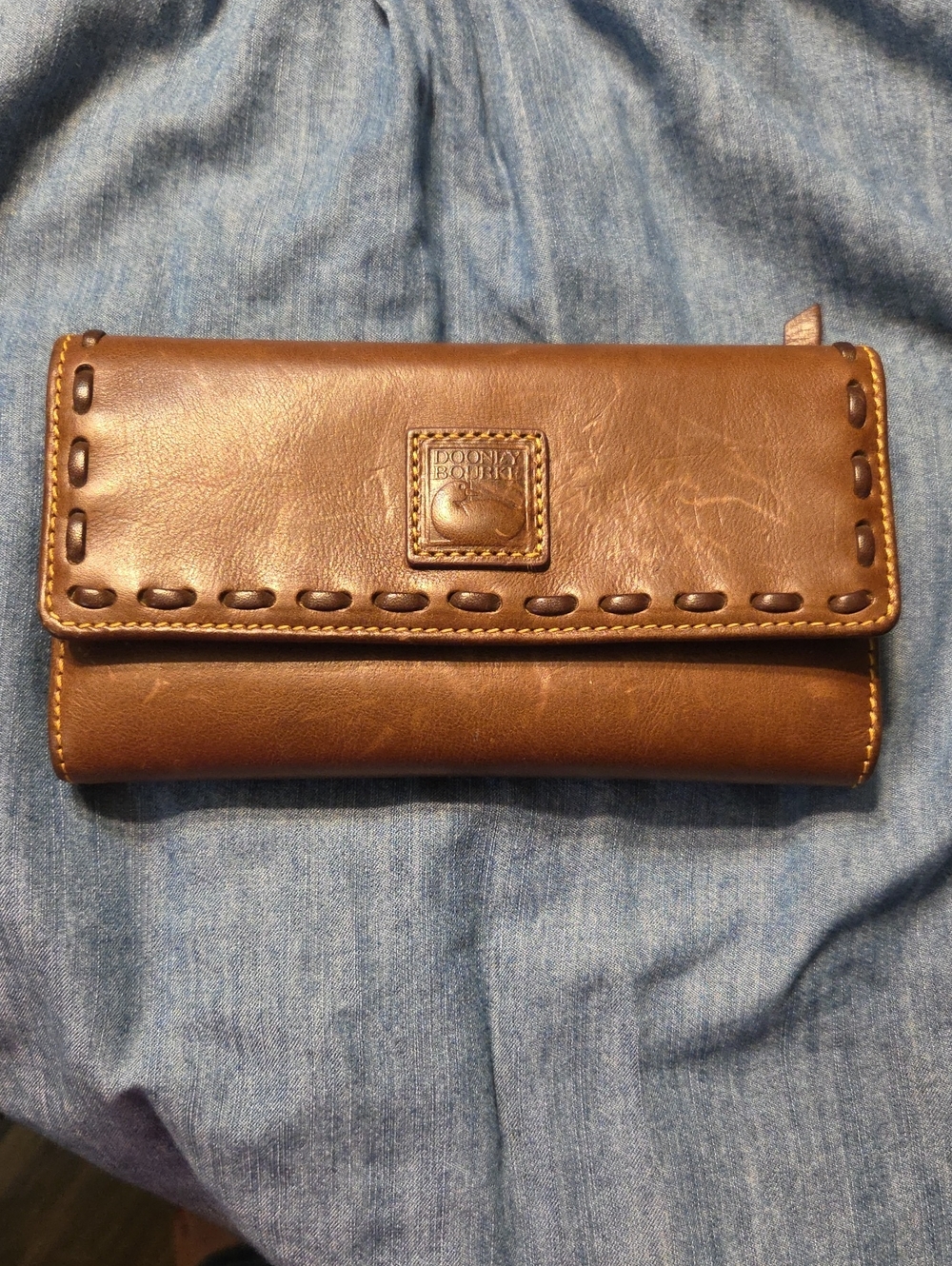 Dooney & Bourke Brown Leather Flap Wallet with Whipstitch Detail